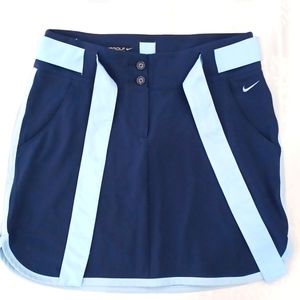 Women skirt, size 4,Nike Golf ,navy blue with light blue belt